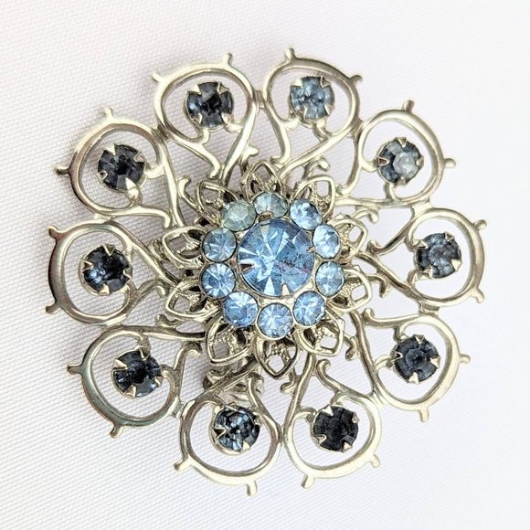 Vintage 1960s Round Silver Brooch Light Blue Rhinestone Circle Pin Flower Petals - Picture 1 of 6